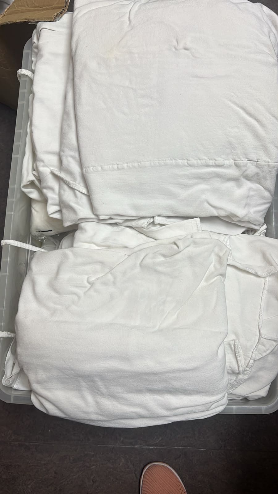 Lot de 100 surblouses en tissu